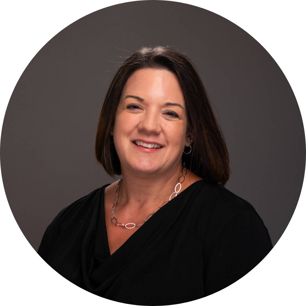 Ann Kaiser smiling for her GVSU headshot.